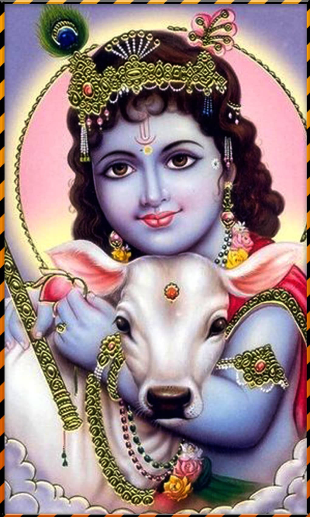 krishna iPhone 桌布 壁紙 — 神聖藍膚神祇克里希納佩戴金色珠寶，懷抱小牛，背景是光芒四射的粉紅色光環。