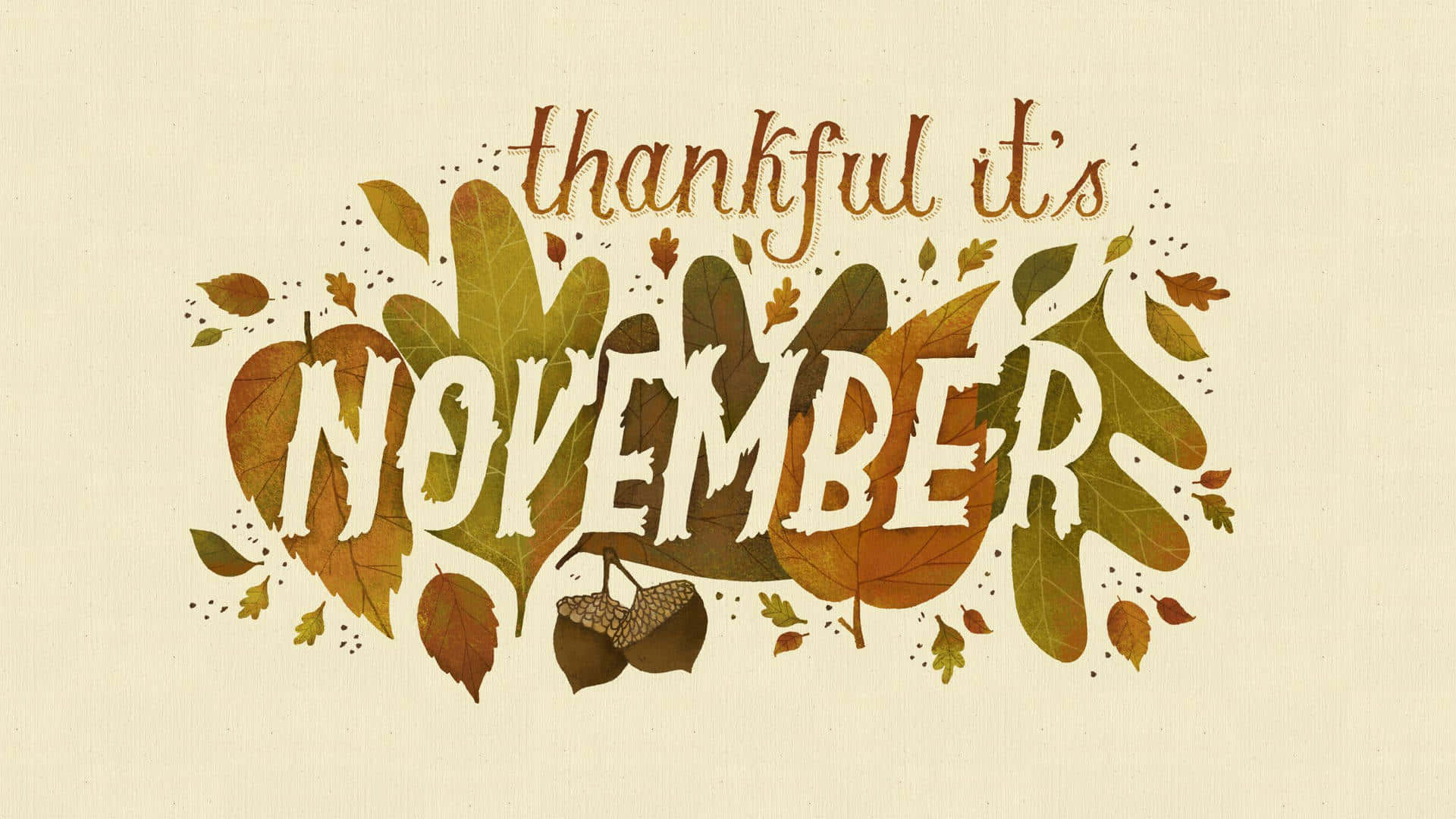 十一月 桌布 壁紙 — 秋葉和橡果藝術地框住「NOVEMBER」這個詞，在紋理奶油色背景上呈現溫暖的秋色調。