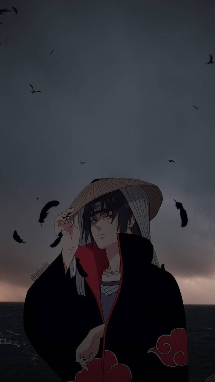 akatsuki itachi 桌布 壁紙 — 穿著曉組織斗篷的動漫角色在昏暗天空下，鳥兒飛翔的海洋邊莊嚴地站立。