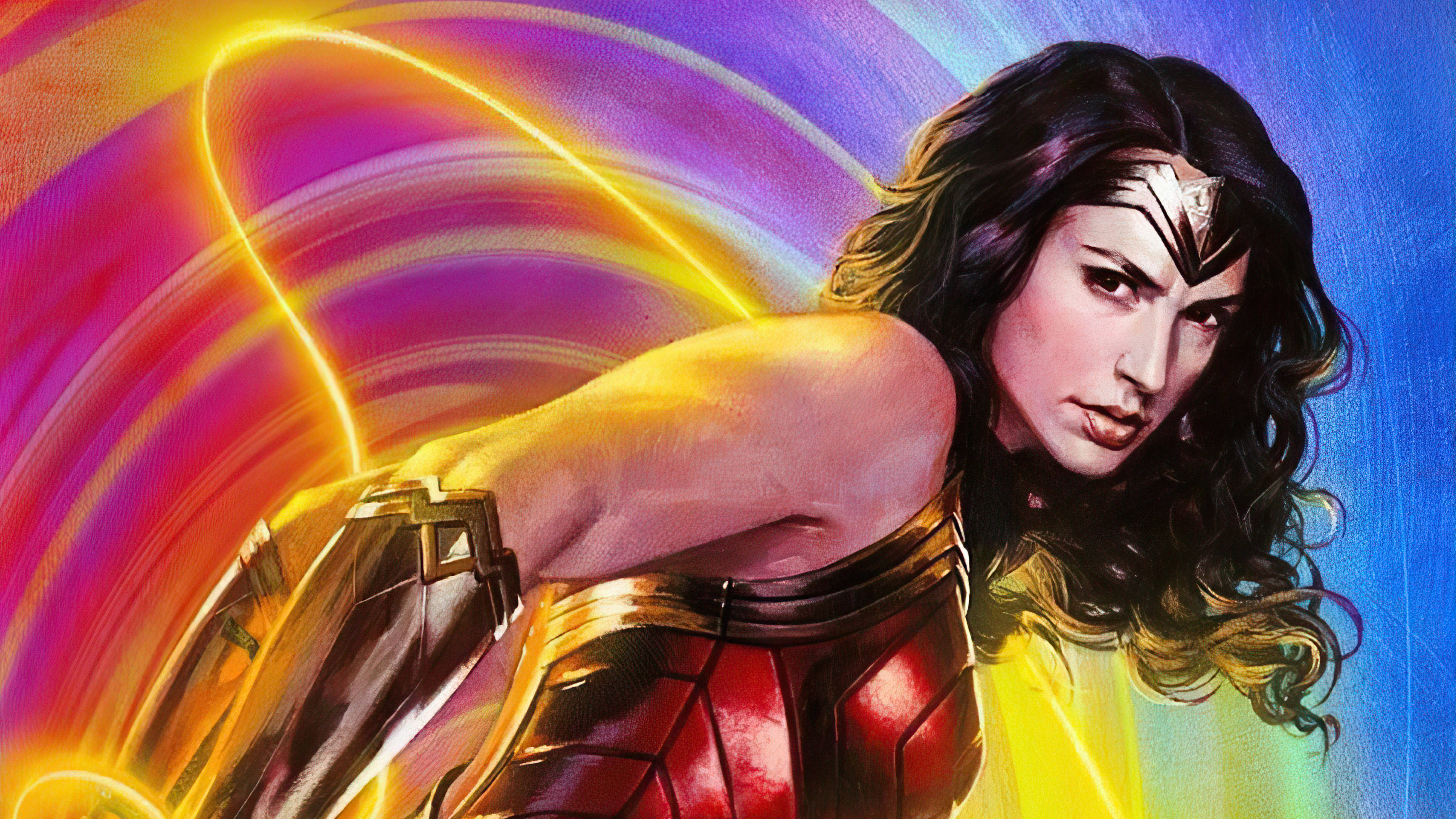 Wonder Woman 1984 桌布 壁紙 — 穿著紅色和金色盔甲的神力女超人揮舞著發光的套索，背景是旋轉的彩虹漩渦。