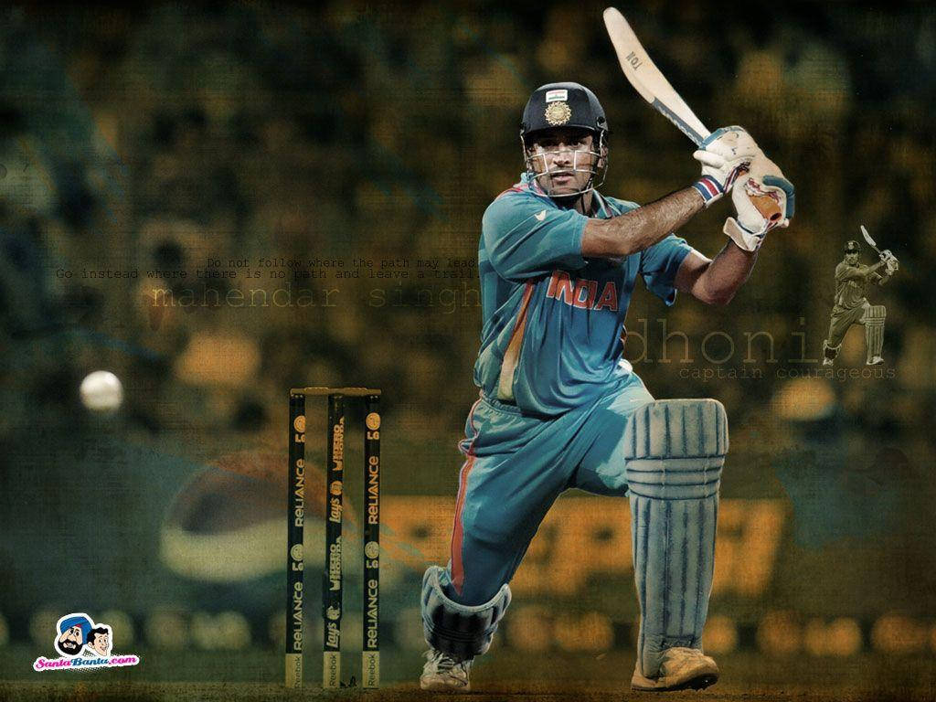 Ms Dhoni 桌布 壁紙 — 穿著藍色印度隊服的板球運動員在模糊的體育場背景下揮動球棒和球。