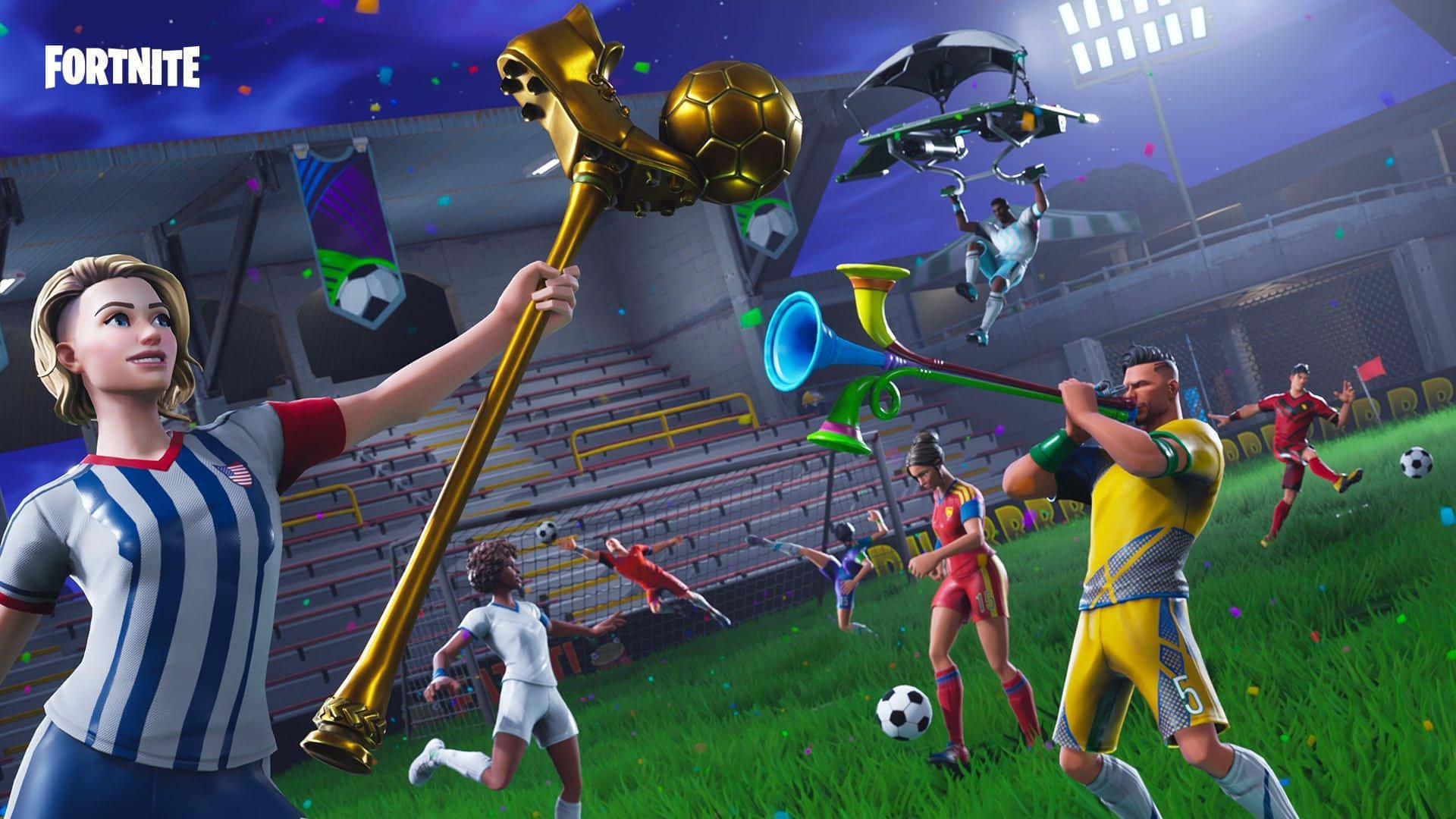 Fortnite Pc 桌布 壁紙 — 穿著足球裝備的《要塞英雄》玩家在充滿活力的體育場上使用巨大的金色足球主題武器戰鬥。