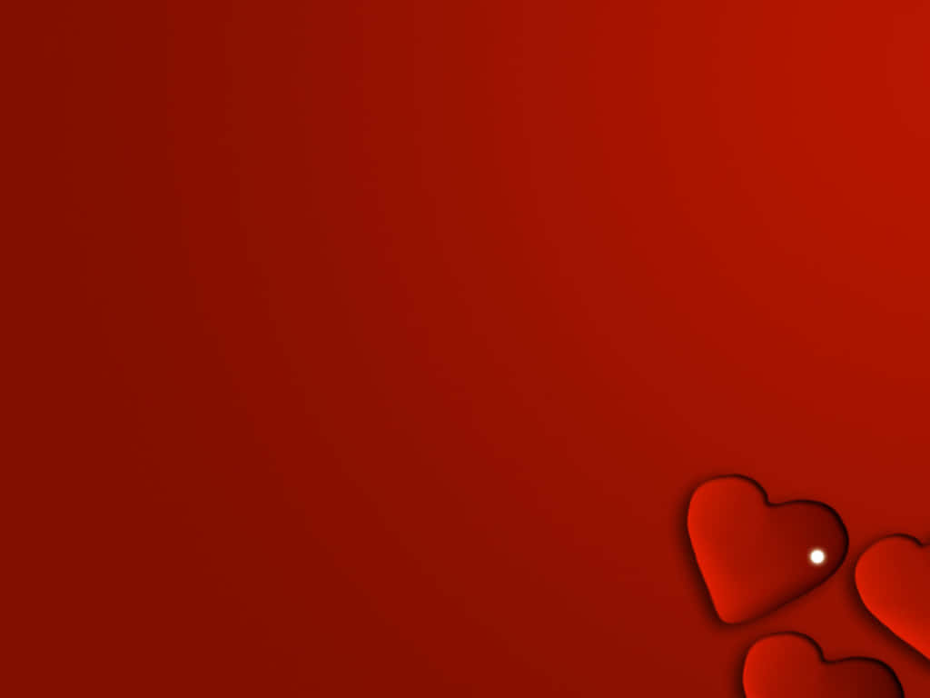 Red Heart 桌布 壁紙 — 立體紅色心形在漸層紅色背景的角落中微妙地放置。