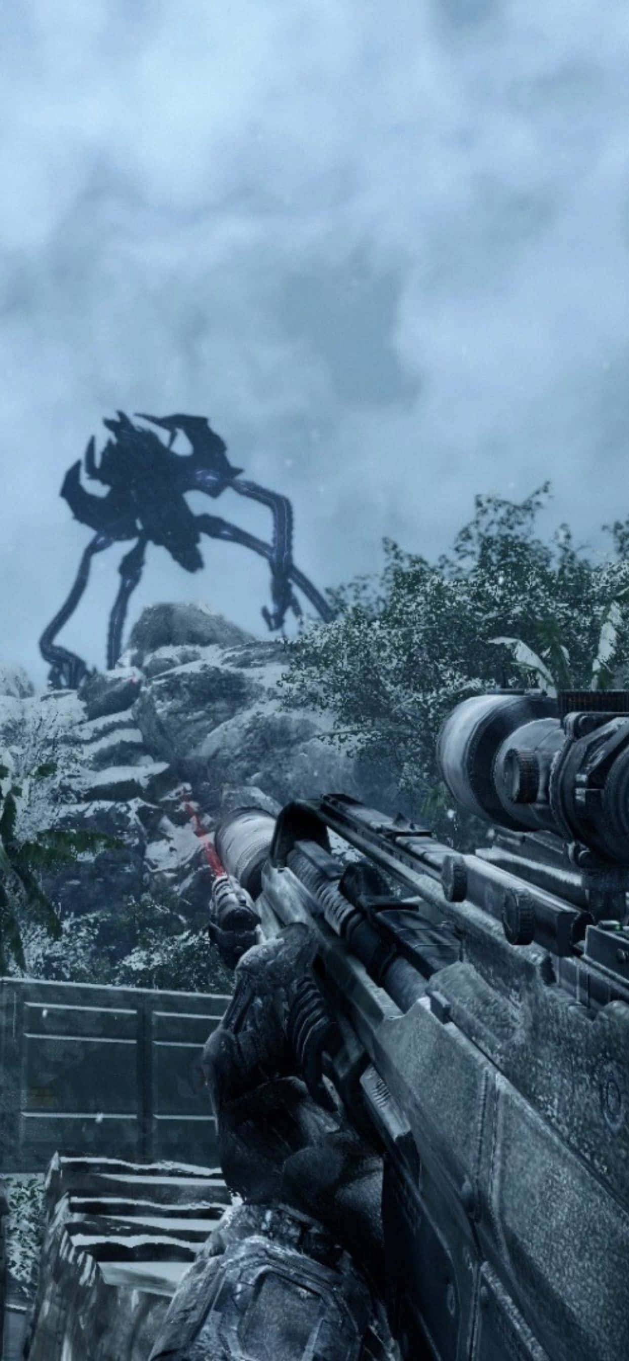 iPhone Xs Max Crysis Warhead 桌布 壁紙 — 第一人稱視角，一名士兵用狙擊步槍瞄準一隻聳立在雪地中的巨型怪異蜘蛛。