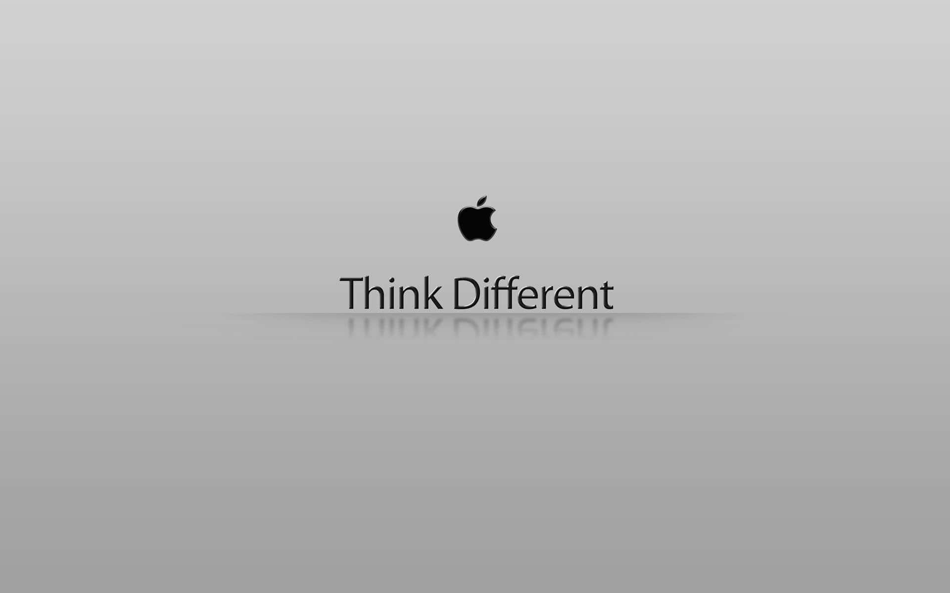 標誌 桌布 壁紙 — 簡約灰色漸變背景，帶有黑色Apple標誌和文字Think Different，下方有微妙倒影。