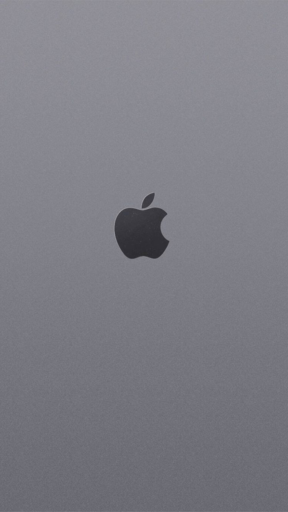 灰色筆記型電腦背面，Apple 標誌置中 — 蘋果標誌 GIF 壁紙