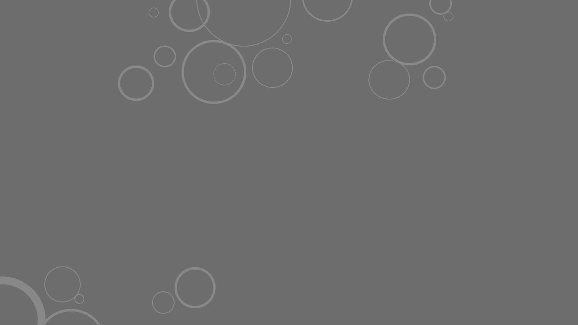 Bubbles 桌布 壁紙 — 簡約灰色背景，散落著淺灰色輪廓圓圈，營造出現代抽象圖案。