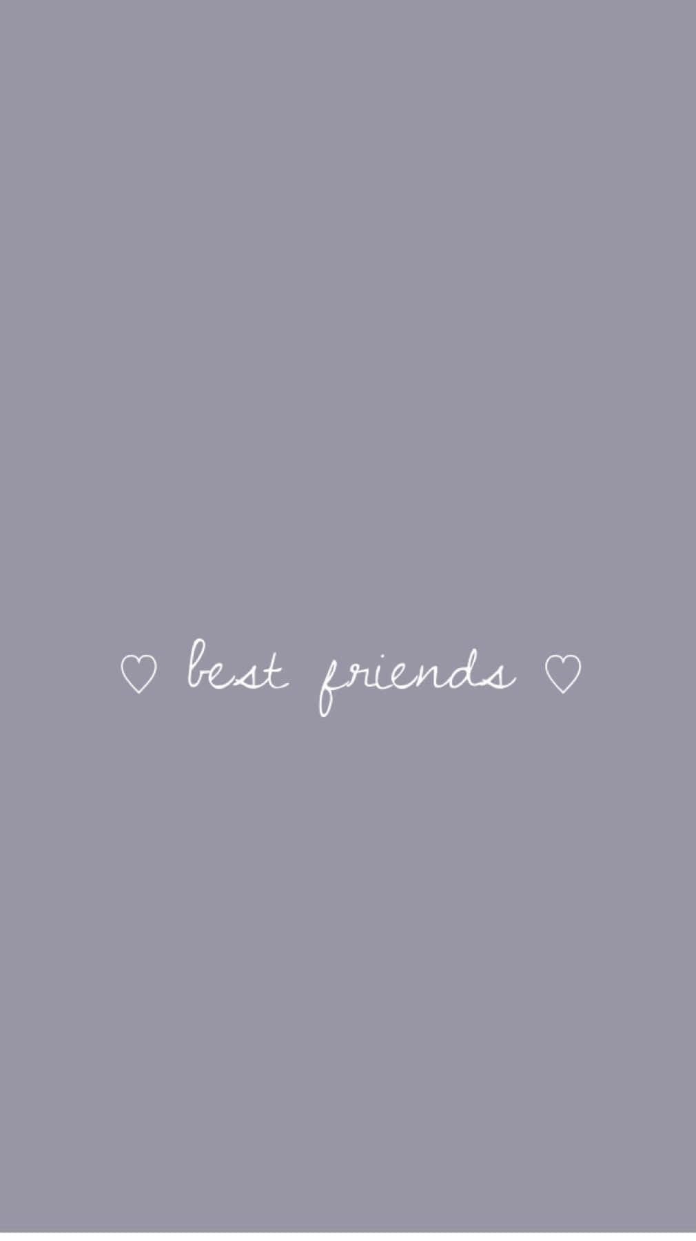 Best Friend Aesthetic 桌布 壁紙 — 簡約灰色背景，白色草書文字寫著 best friends，兩側有心形圖示。