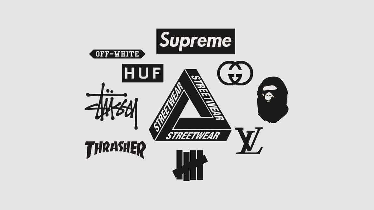 Off White Desktop 桌布 壁紙 — 簡約灰色背景展示Supreme和BAPE等標誌性街頭服飾及奢侈品牌的醒目黑色標誌。