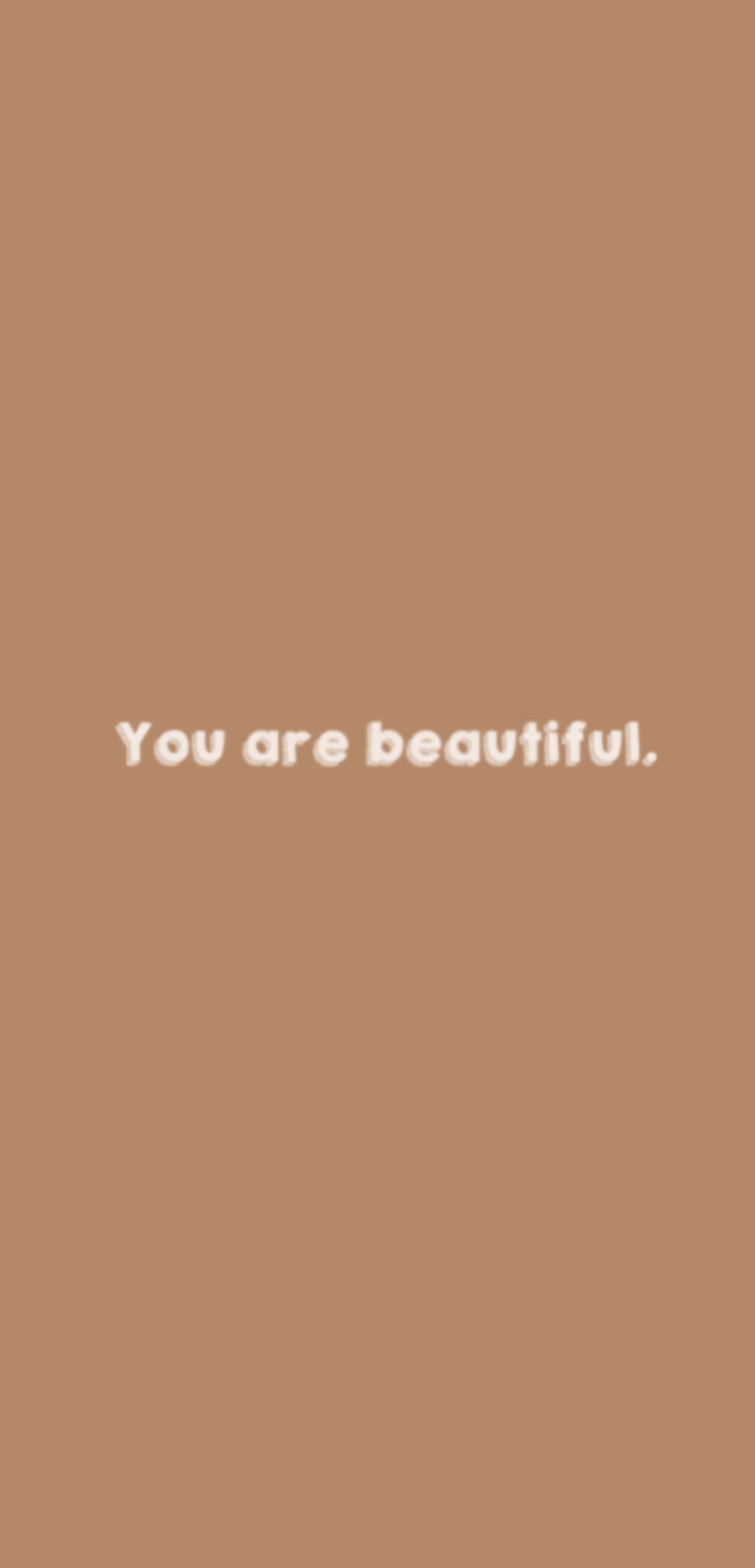 You Are Beautiful 桌布 壁紙 — 簡約米色背景，中央白色文字寫著「你很美」。