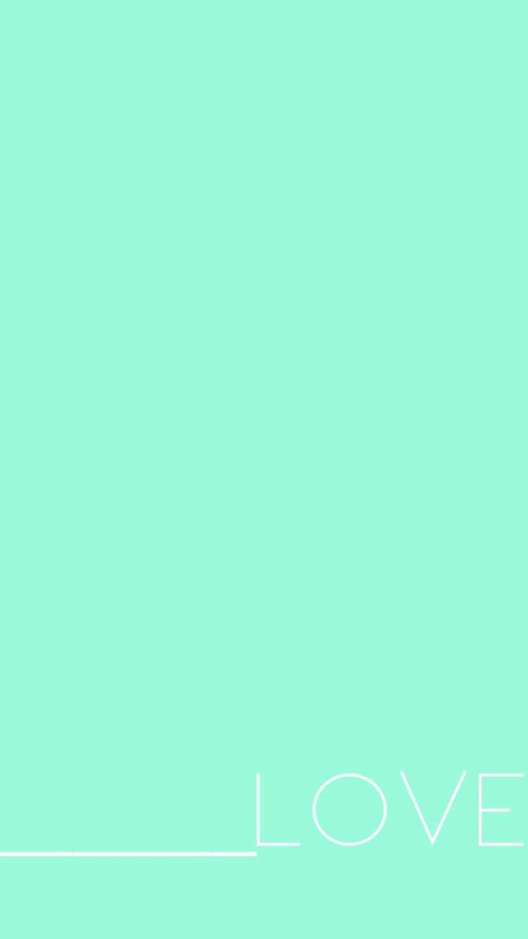 Mint Green iPhone 桌布 壁紙 — 簡約薄荷綠色背景，右下角有白色細小寫字母 LOVE。