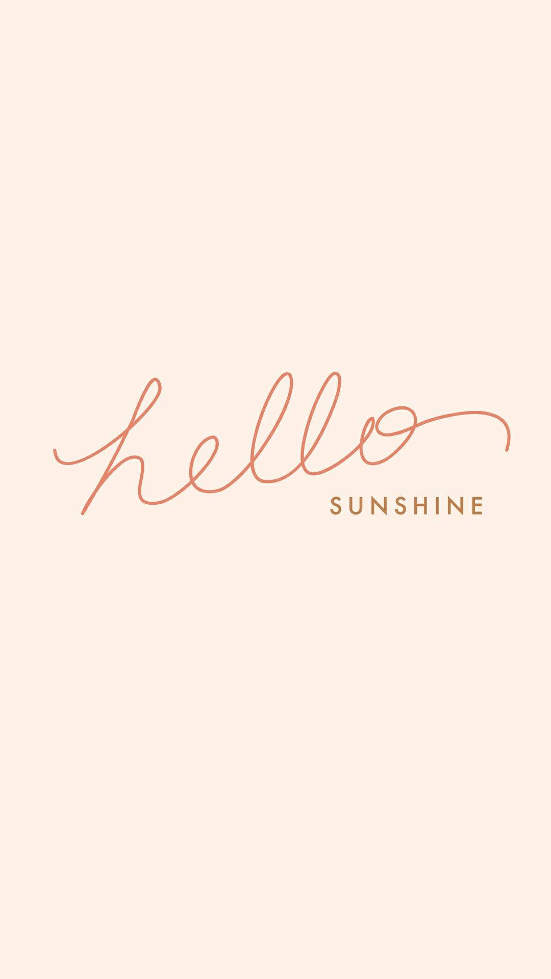 極簡 iPhone 桌布 壁紙 — 簡約蜜桃色背景，優雅銅色字體寫著hello sunshine。
