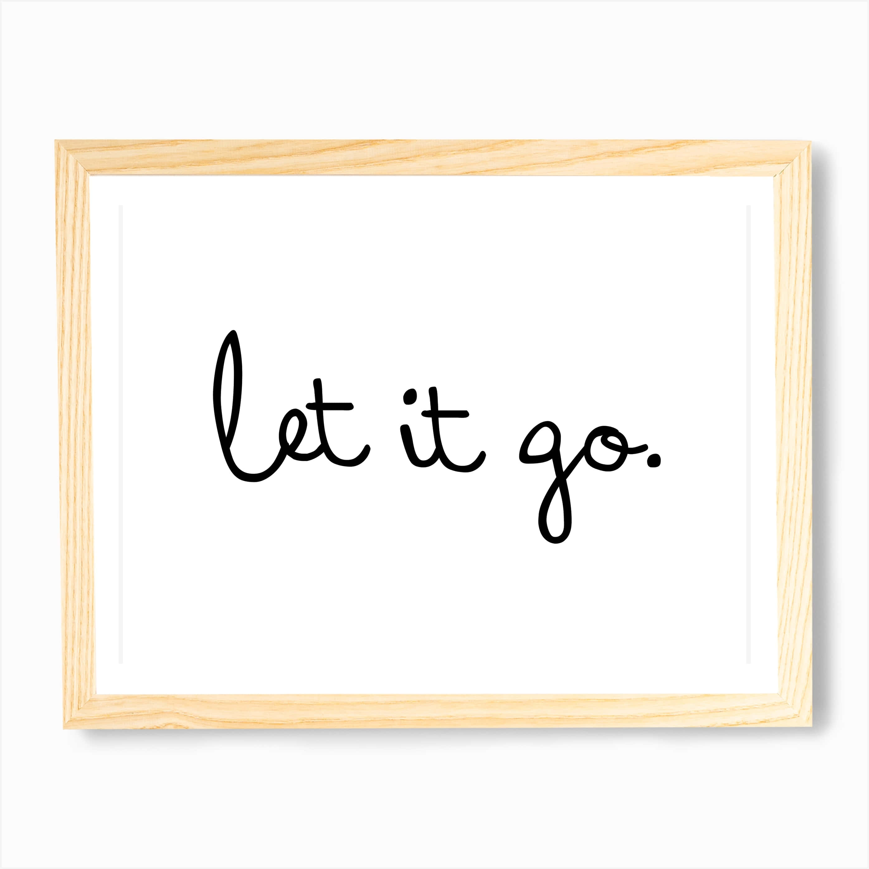 let it go 桌布 壁紙 — 簡約風格裱框牆飾，白色背景上以黑色草書寫有「let it go.」字樣。