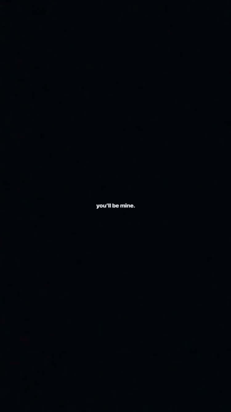 語錄 桌布 壁紙 — 簡約黑色背景，中央白色文字寫著 you'll be mine。