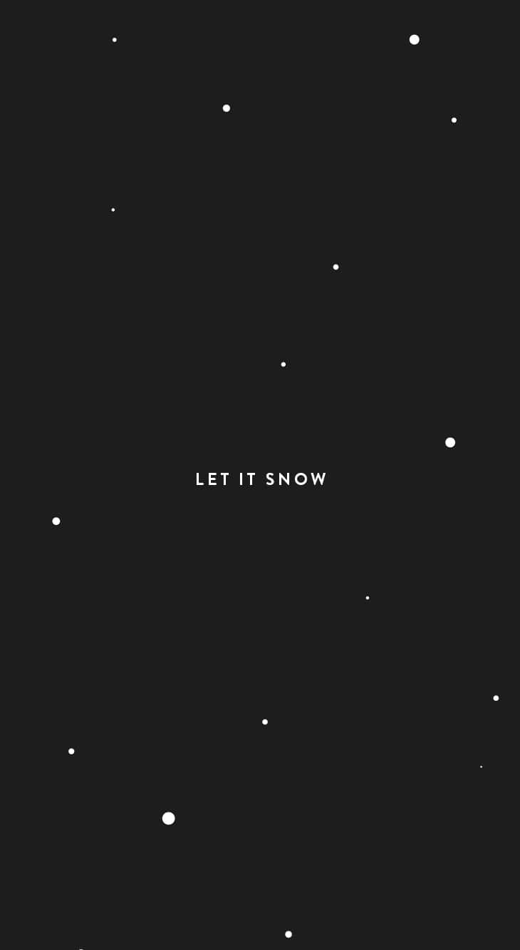 聖誕美學 桌布 壁紙 — 簡約黑色背景，散落白色圓點，中央文字寫著 let it snow。