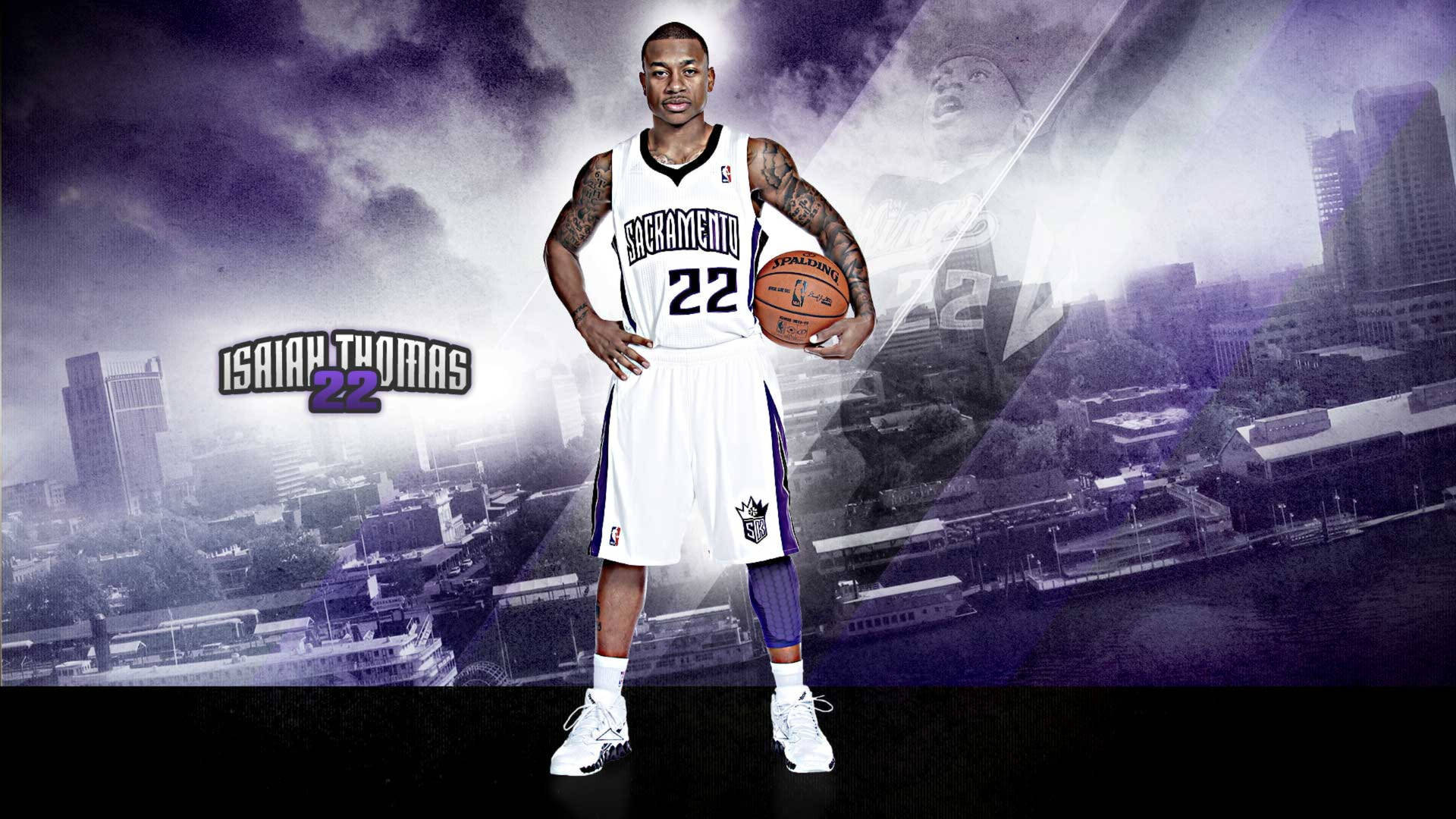 職業籃球運動員 Isaiah Thomas 身穿沙加緬度國王隊球衣持球。 — Michael B Jordan 壁紙