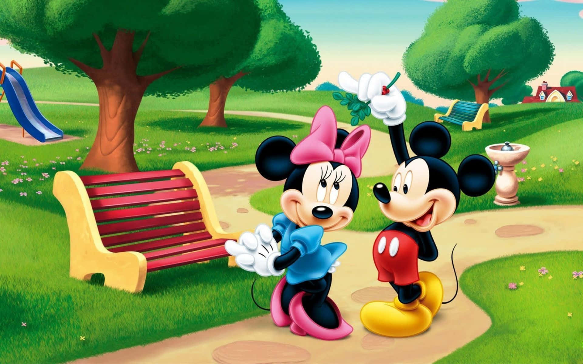 Mickey And Minnie Mouse 桌布 壁紙 — 米奇和米妮老鼠在一個充滿活力的卡通公園裡愉快地擺姿勢，公園裡有綠樹和紅色長椅。