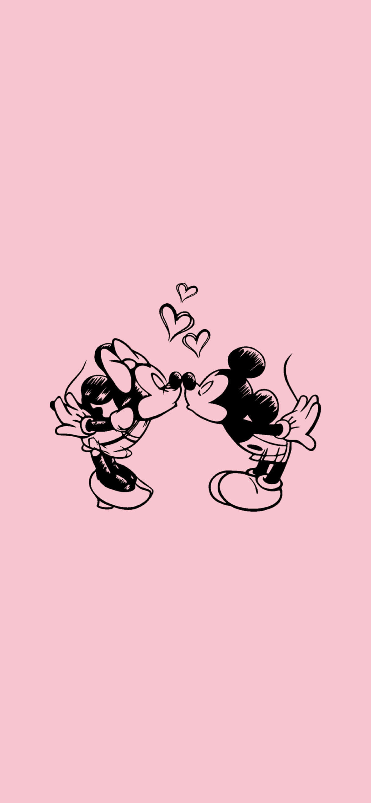 Minnie Mouse Pink 桌布 壁紙 — 米奇和米妮老鼠在柔和的粉紅色背景上親吻，周圍漂浮著愛心。