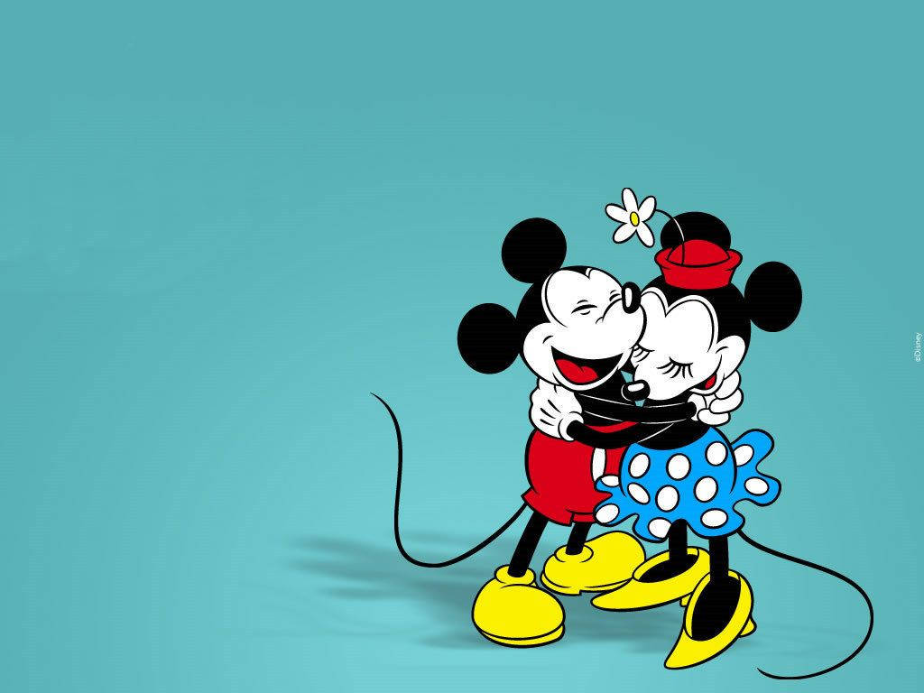 minnie 桌布 壁紙 — 米奇和米妮老鼠在純青色背景上快樂地擁抱，並有一朵白色雛菊。