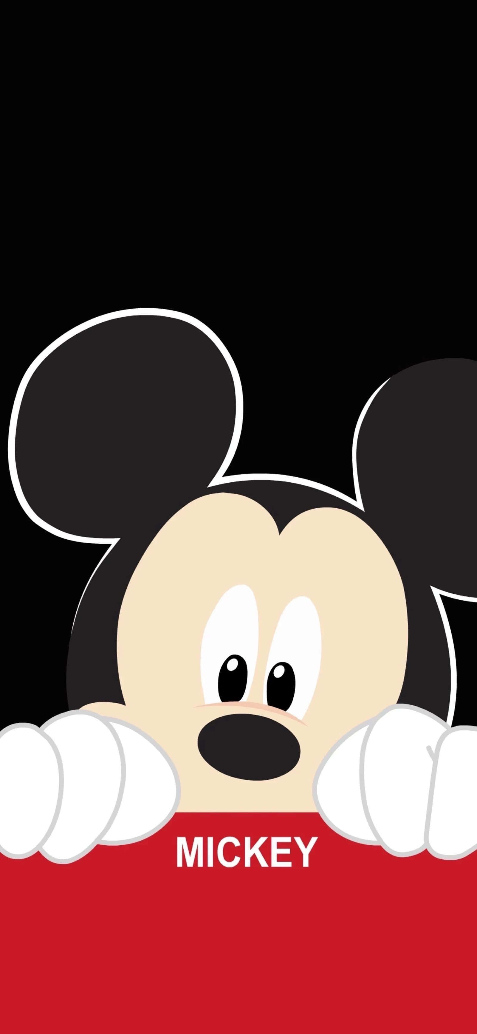 Mickey Mouse Ears 桌布 壁紙 — 米奇老鼠在黑色背景上用大眼睛從紅色障礙物上方偷看。