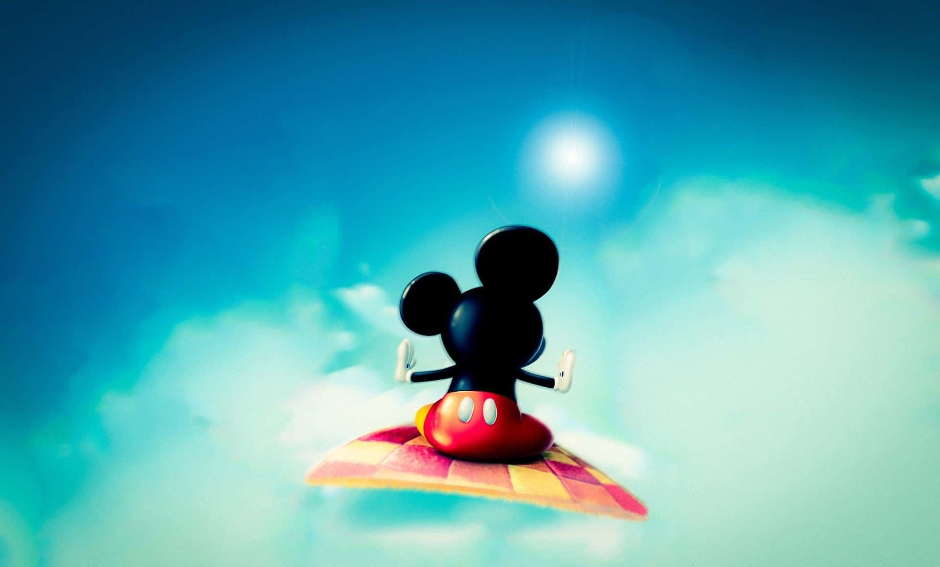 Cool Disney 桌布 壁紙 — 米奇老鼠盤腿坐在一張格子毯上，漂浮在晴朗的藍天中，天空有 fluffy 雲朵和發光的太陽。