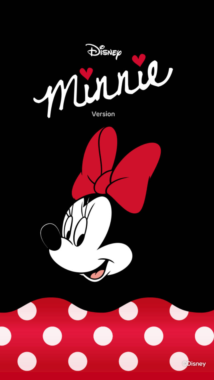minnie 桌布 壁紙 — 米妮老鼠帶著她標誌性的紅色蝴蝶結微笑，背景為黑色，下擺有紅色圓點。