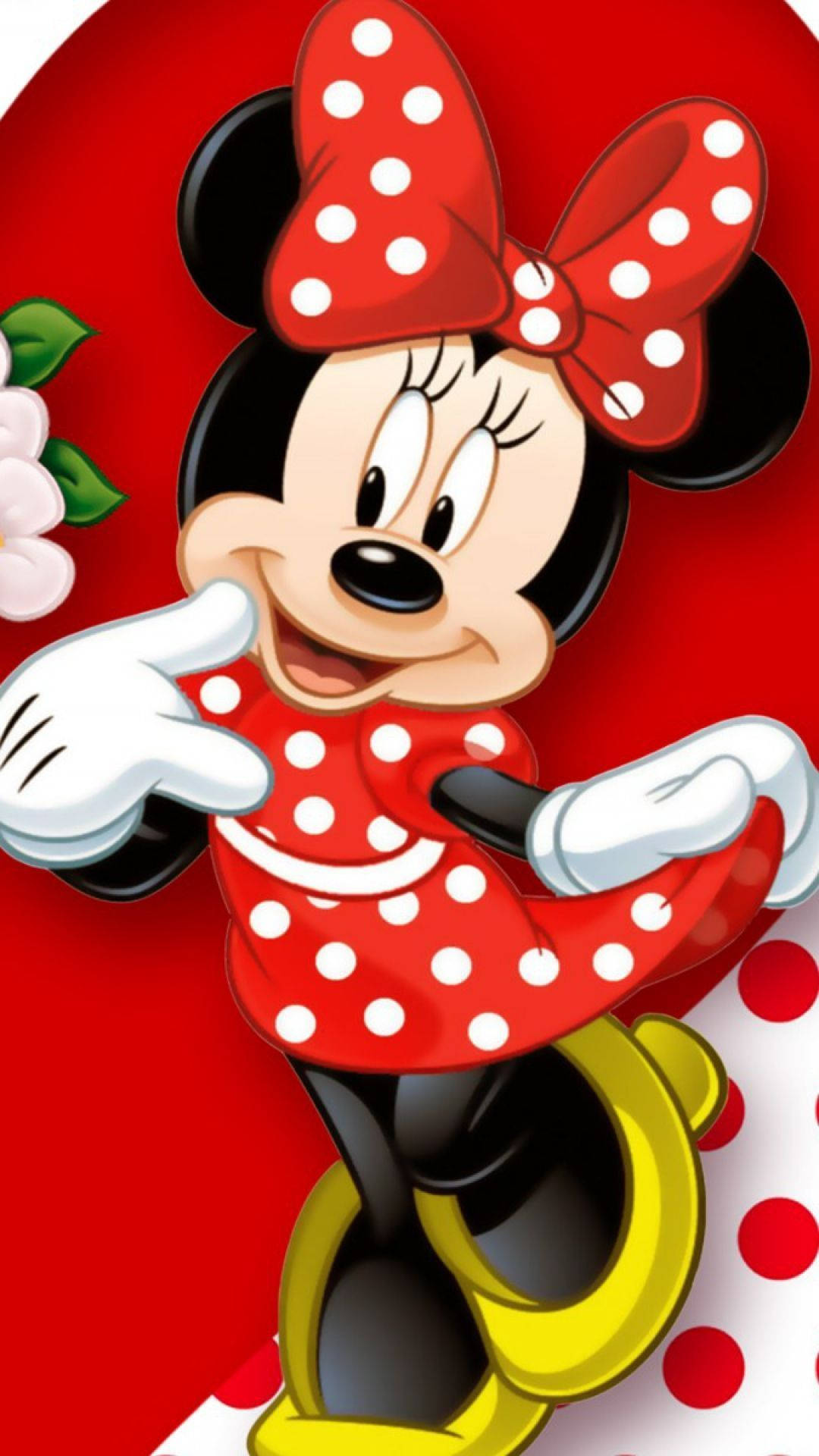 minnie 桌布 壁紙 — 米妮老鼠穿著紅色圓點裙和蝴蝶結，在鮮豔的紅色背景上微笑，背景有白色花朵。