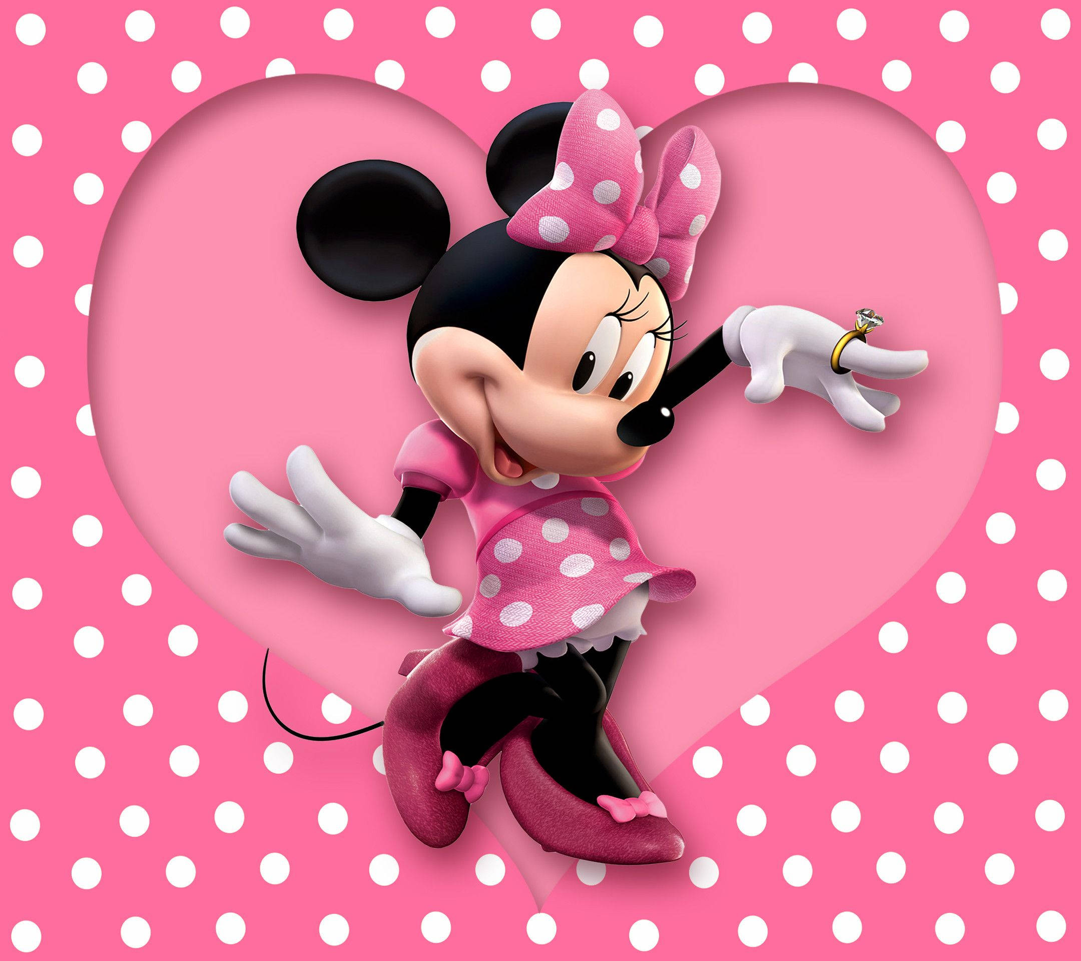 minnie 桌布 壁紙 — 米妮老鼠身穿粉紅色圓點裙，在粉紅和白色圓點背景的心形鏤空中愉快地擺姿勢。