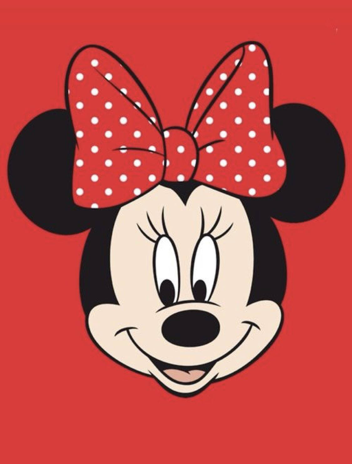 minnie 桌布 壁紙 — 米妮老鼠開心的臉龐，配上標誌性的紅色圓點蝴蝶結，在純紅色背景上。