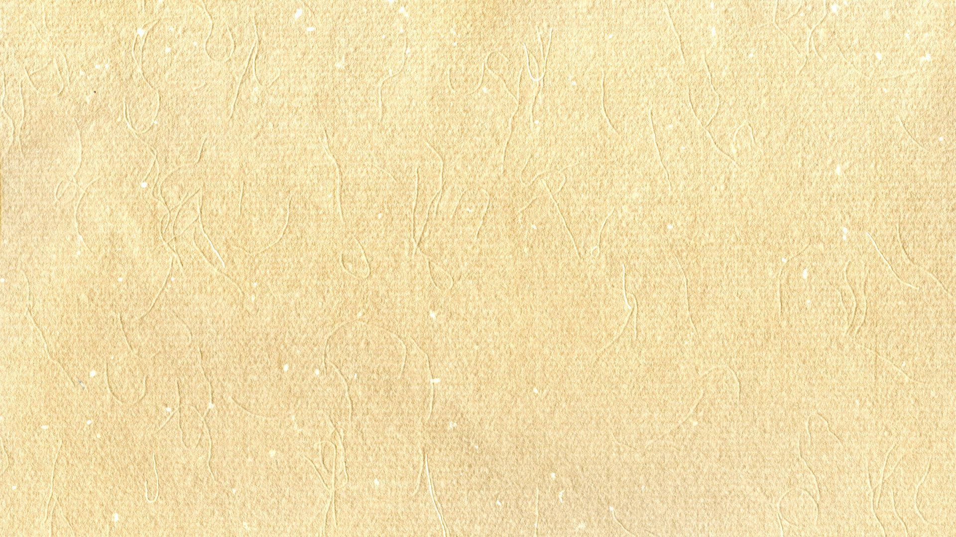 Beige Minimalist 桌布 壁紙 — 米色紋理壁紙的特寫，帶有微妙的壓花漩渦和斑點，營造溫暖的有機表面。