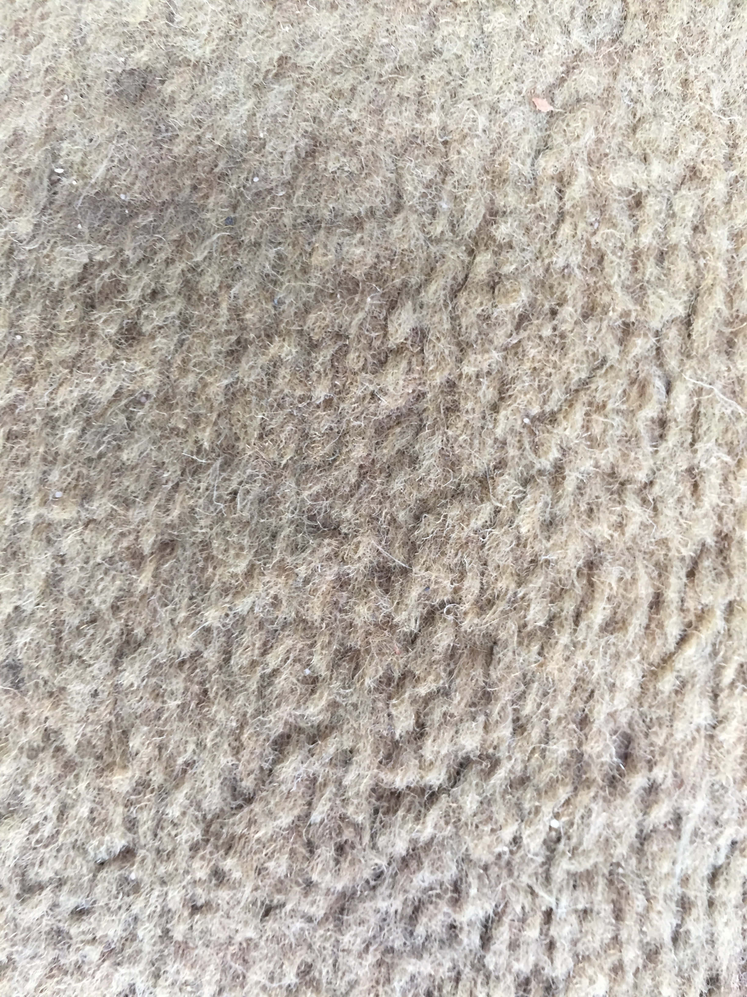 Carpet Texture 桌布 壁紙 — 米色羊毛織物的特寫，具有紋理、柔軟纖維和微妙的色調變化。