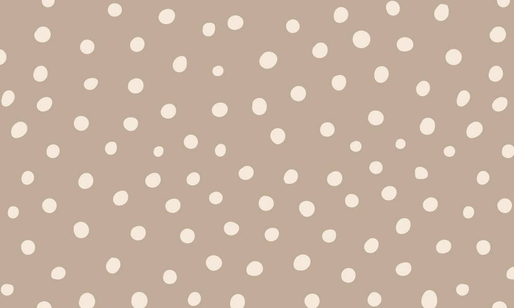 Dot 桌布 壁紙 — 米色背景上點綴著散落的白色圓點，大小不一。