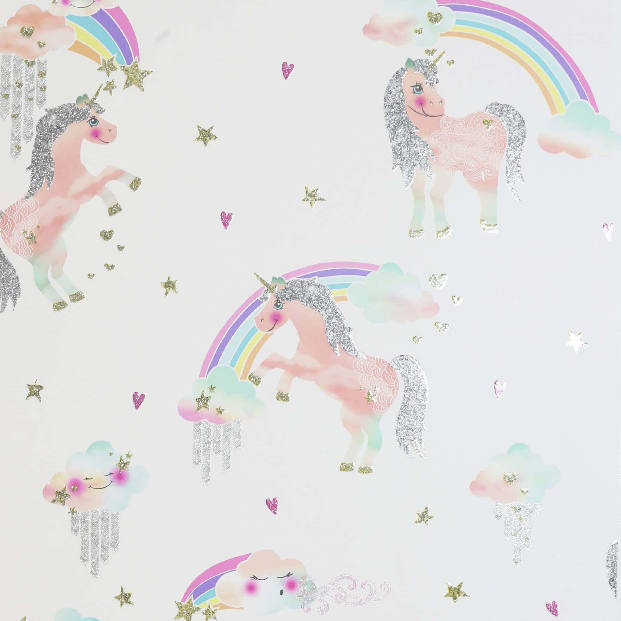 Pastel Unicorn 桌布 壁紙 — 粉彩粉紅獨角獸閃爍銀色鬃毛，在色彩繽紛的彩虹和微笑的雲朵下歡快地跳躍，雲朵上點綴著星星和愛心。