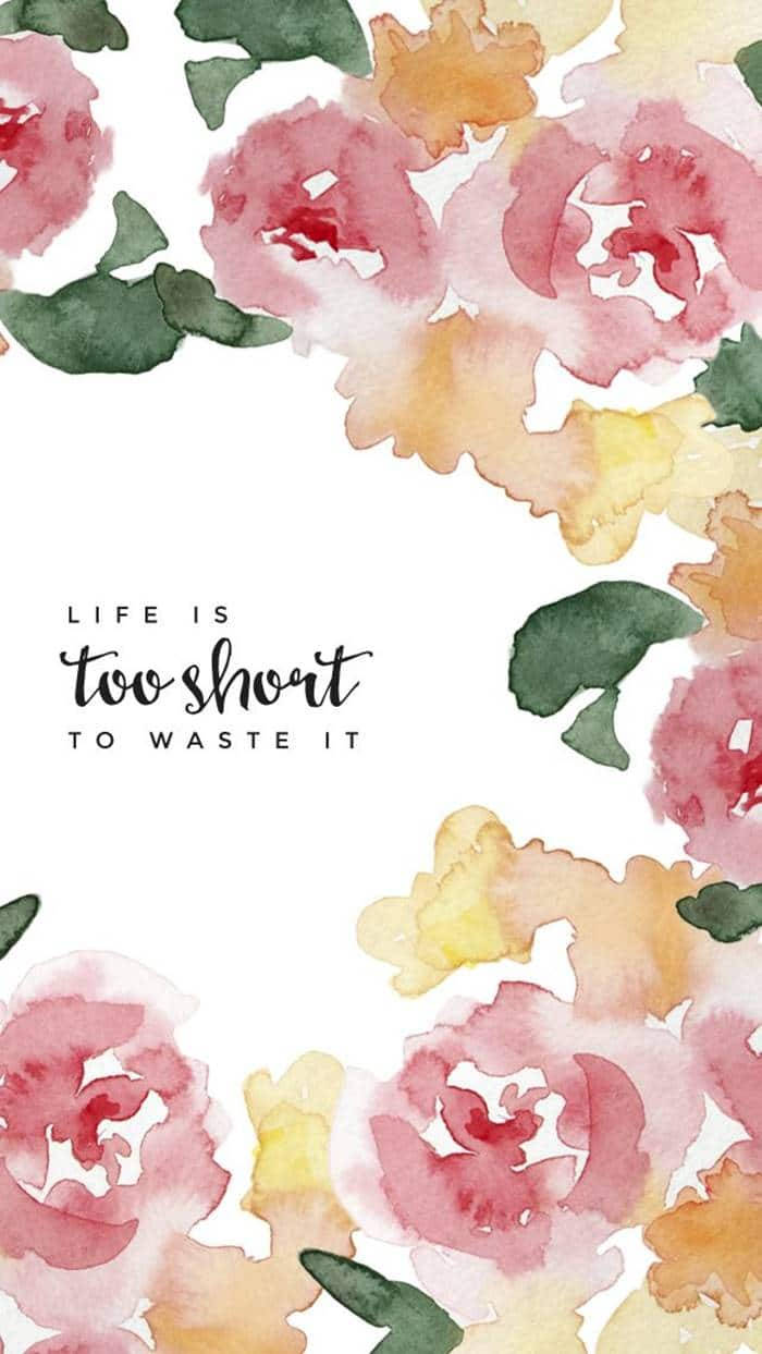 Inspirational Quotes 桌布 壁紙 — 粉紅、黃色和綠色的水彩花朵圍繞著一個白色空間，上面寫著「人生苦短，勿浪費」這句話。