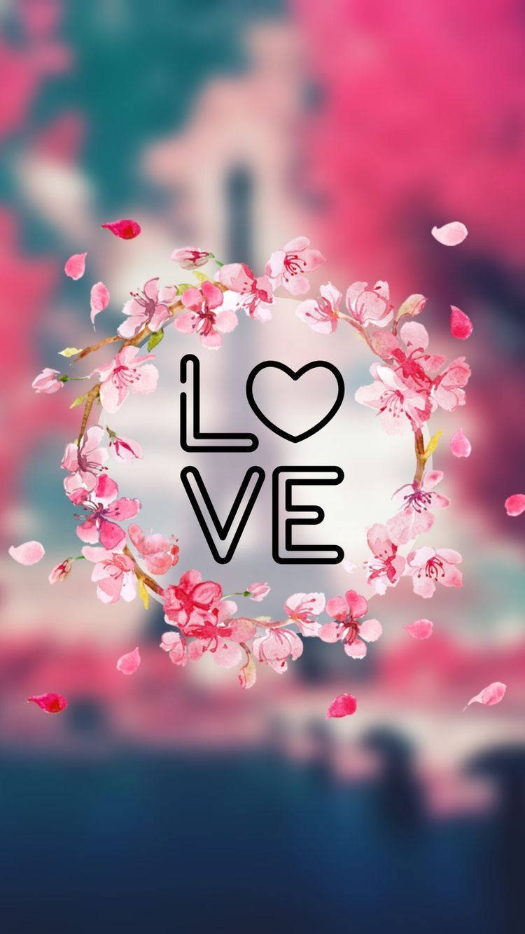 Love Phone 桌布 壁紙 — 粉紅櫻花組成的心形花環框住LOVE字樣，背景是模糊的春日景色。