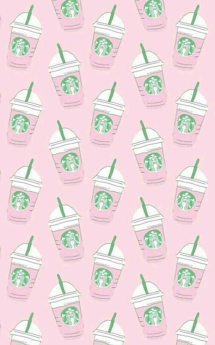 冰 桌布 壁紙 — 粉紅色Starbucks飲料杯搭配綠色吸管，在淺粉紅色背景上以柔和粉彩圖案重複。