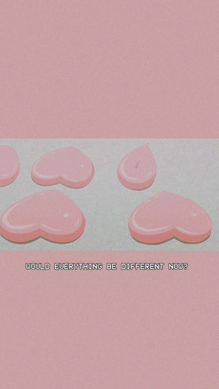 Soft Girl Aesthetic 桌布 壁紙 — 粉紅色光澤心形漂浮在柔和粉彩背景上，帶有懷舊文字覆蓋。