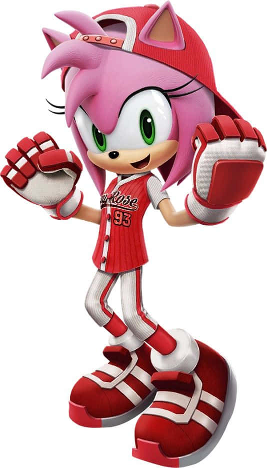 Sonic Forces Speed Battle 桌布 壁紙 — 粉紅色刺蝟穿著紅色棒球制服和帽子，在白色背景前舉起拳頭，開心地擺姿勢。