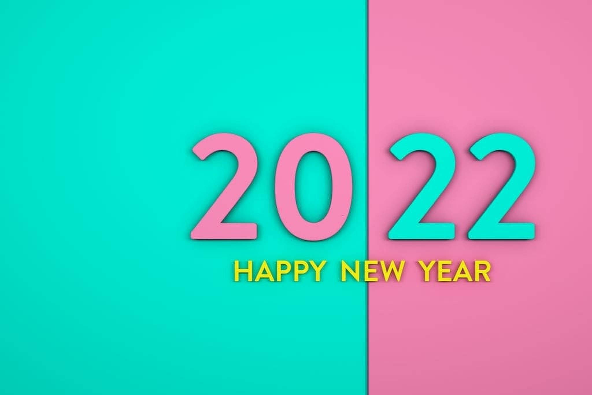 New 桌布 壁紙 — 粉紅色和藍綠色的粗體2022文字，橫跨充滿活力的粉紅色和藍綠色背景，下方有黃色的「HAPPY NEW YEAR」。