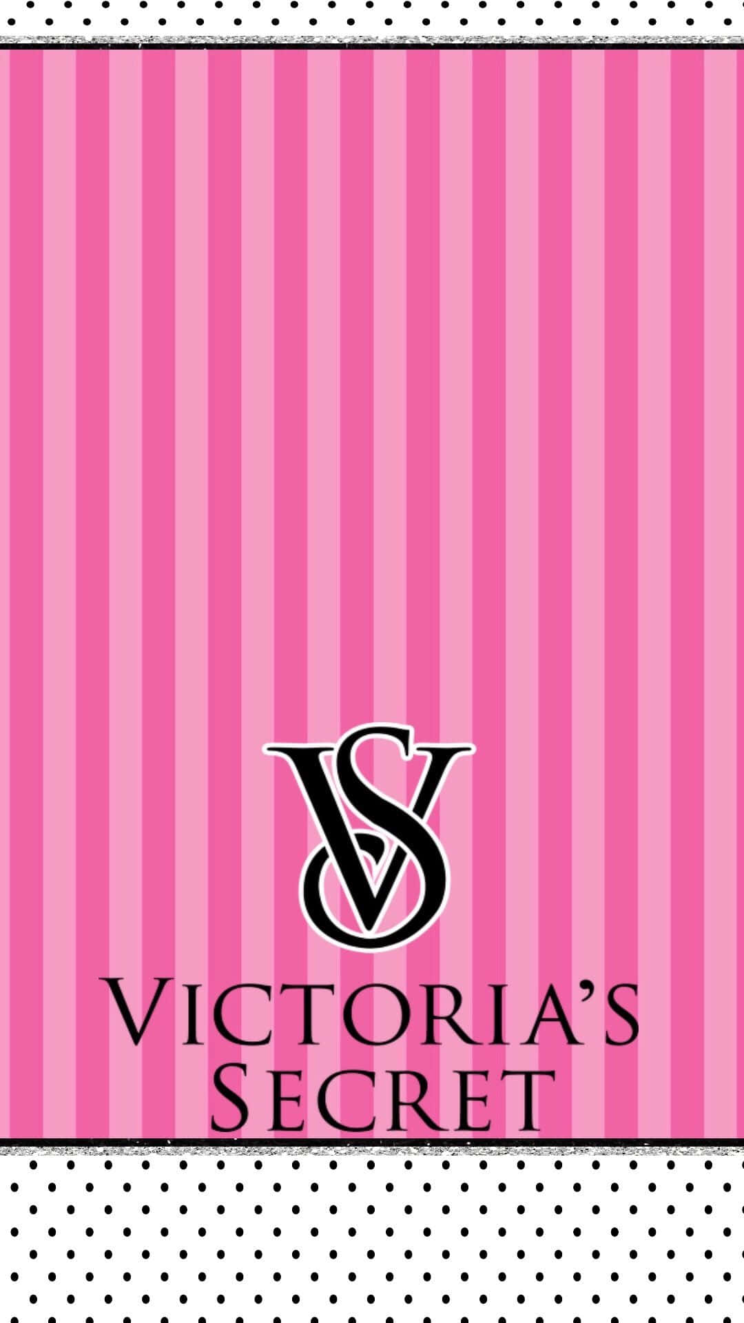 維多利亞的秘密 桌布 壁紙 — 粉紅色垂直條紋壁紙，Victoria's Secret 標誌居中，位於黑色和白色圓點邊框之間。