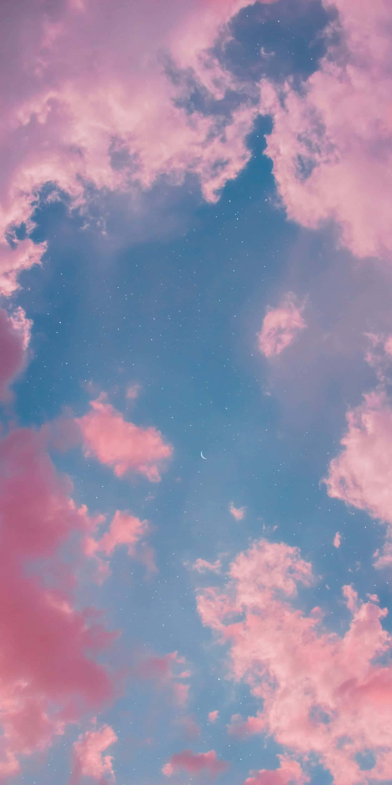 粉紅色天空與雲朵和月亮 壁紙