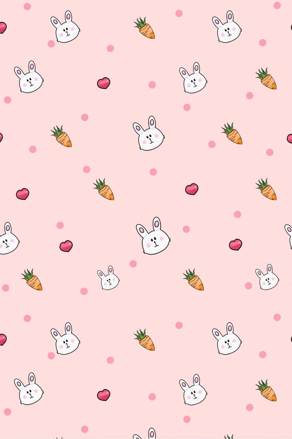 Pink Bunny 桌布 壁紙 — 粉紅色柔和壁紙圖案，可愛白色兔子頭、橙色胡蘿蔔和粉紅色心形散落在表面。