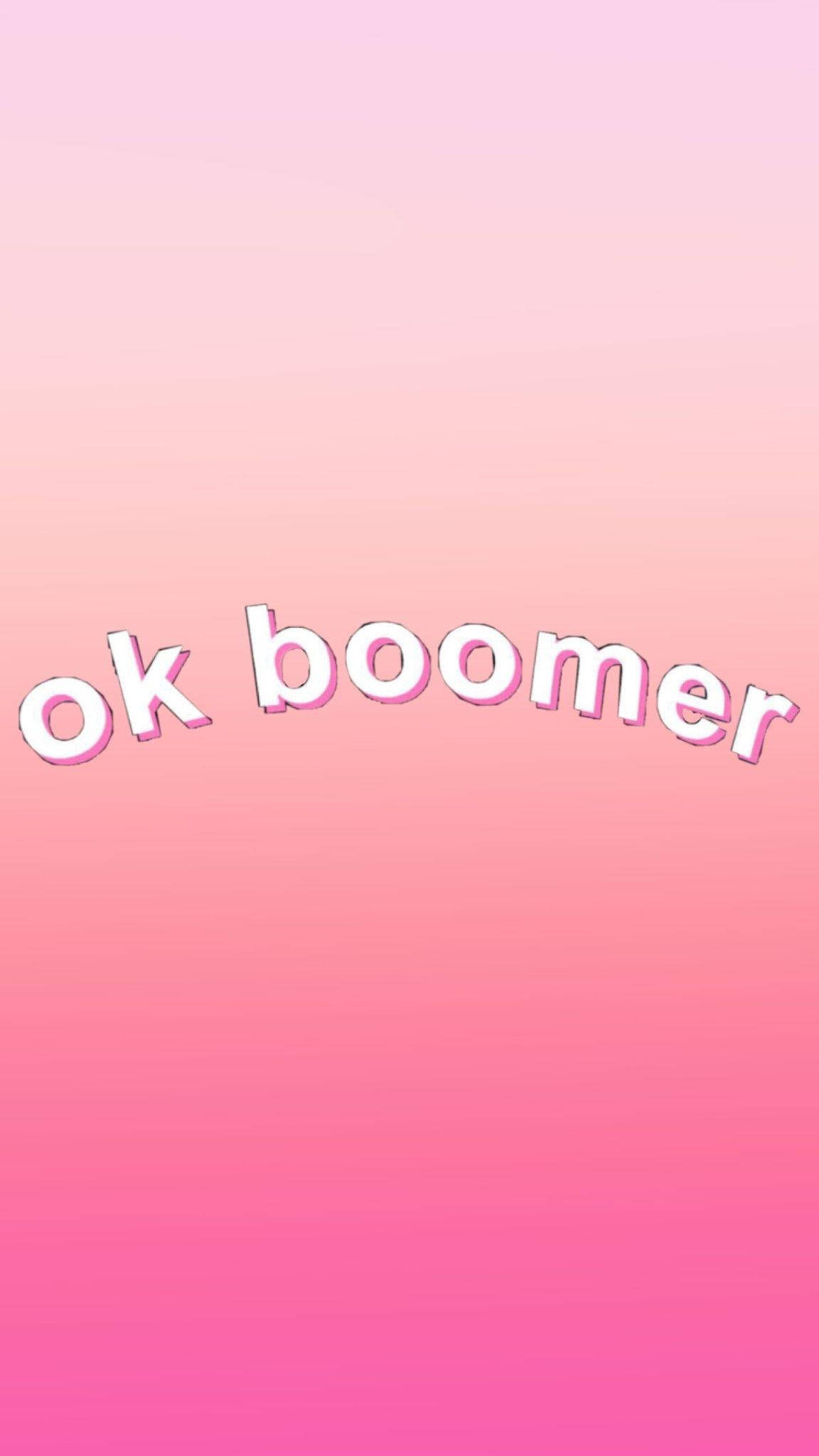 粉紅色 桌布 壁紙 — 粉紅色漸層背景，帶有「ok boomer」文字，採用俏皮的白色字體和粉紅色輪廓。