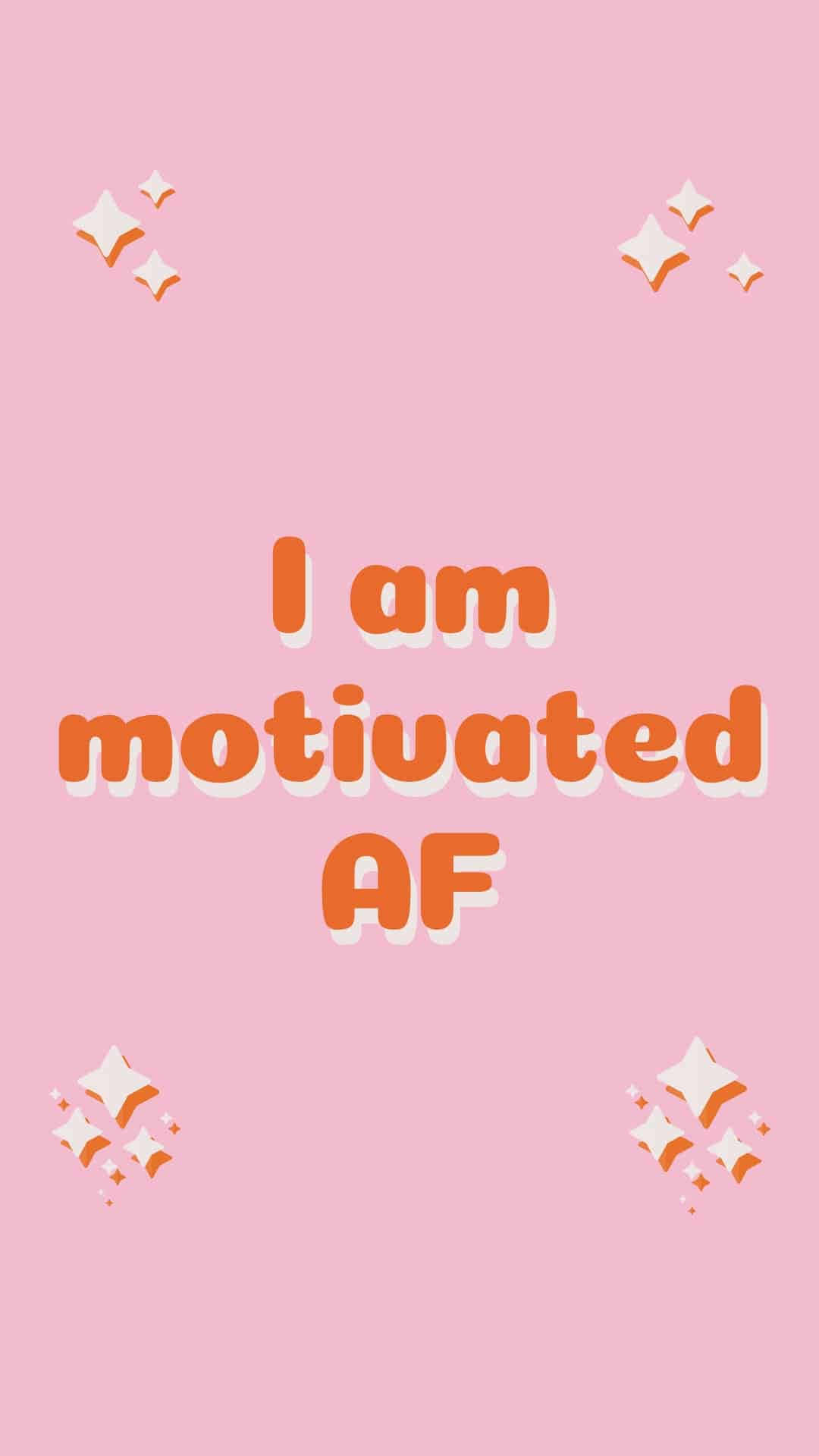 肯定語 桌布 壁紙 — 粉紅色背景，上面有粗體橙色文字寫著「I am motivated AF」，周圍環繞著白色和橙色的閃光。