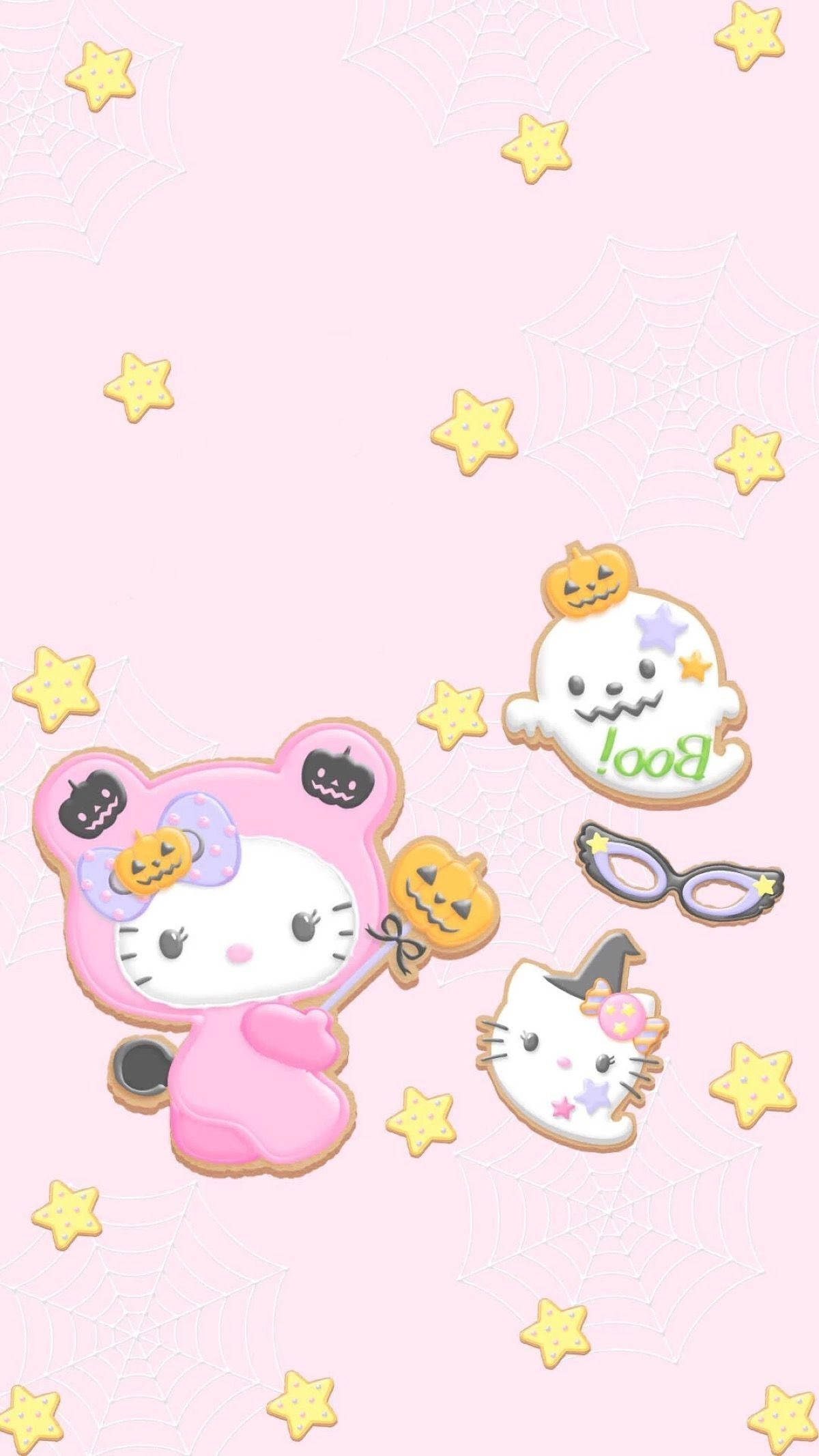 Cute Sanrio 桌布 壁紙 — 粉紅色背景，帶有可愛的萬聖節主題Hello Kitty角色和黃色星星。