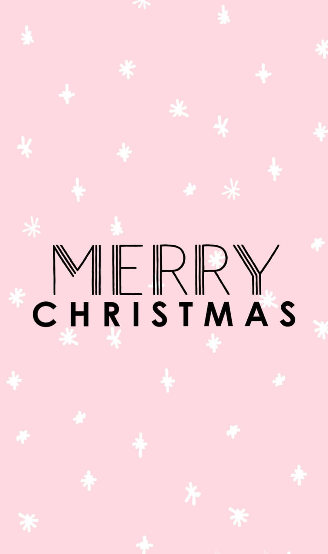 聖誕節 桌布 壁紙 — 粉紅色背景，帶有白色雪花圖案和粗體黑色「MERRY CHRISTMAS」文字。