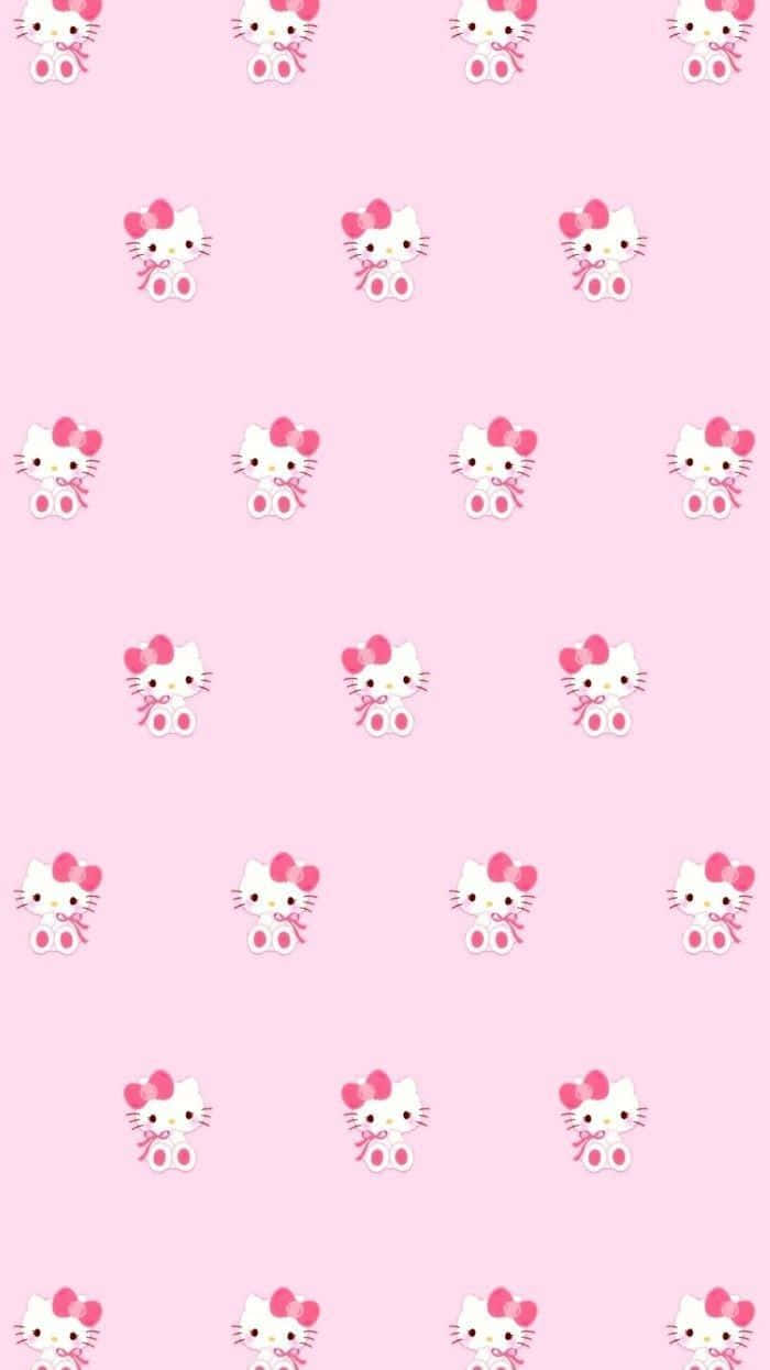 Hello Kitty 桌布 壁紙 — 粉紅色背景，帶有重複的可愛卡通風格Hello Kitty角色。