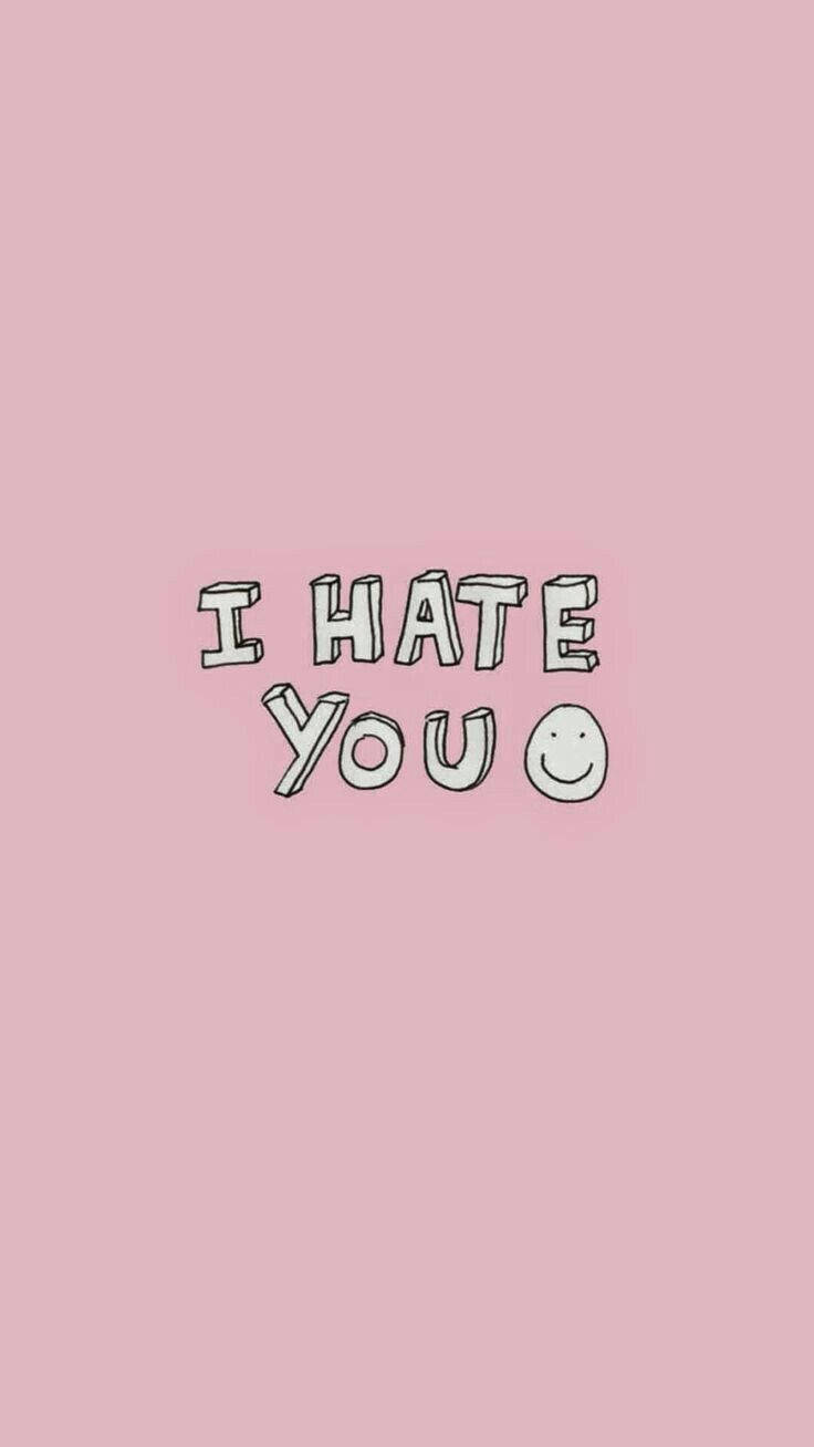 I Hate You 桌布 壁紙 — 粉紅色背景，旁邊有一個笑臉，上面有粗體白色文字寫著「我恨你」。