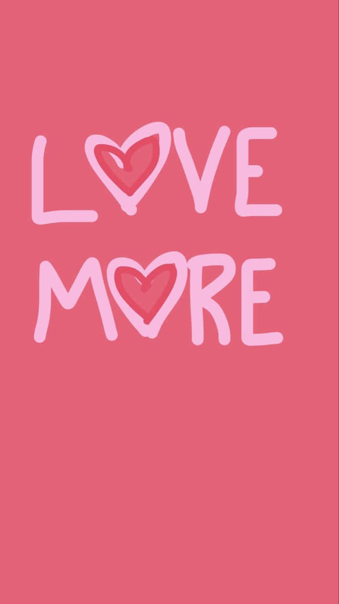 Brightening 桌布 壁紙 — 粉紅色背景，淺粉紅色的「LOVE MORE」文字，O 被心形符號取代。