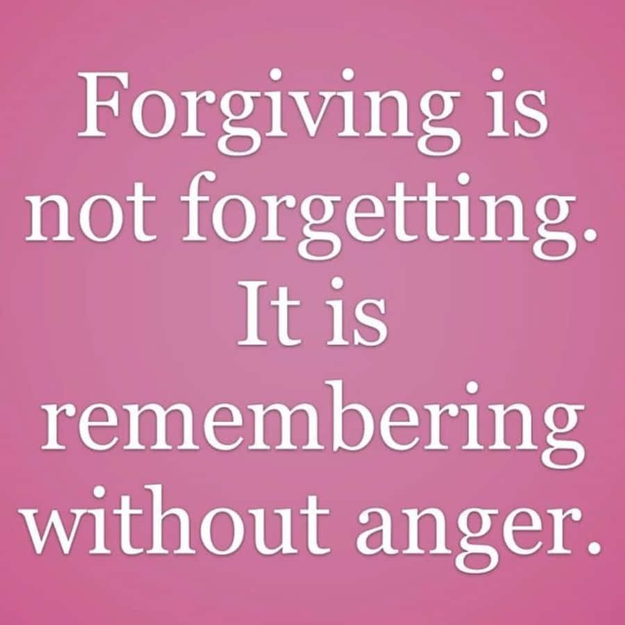 Forgiving 桌布 壁紙 — 粉紅色背景，白色文字寫著「原諒不是忘記。而是沒有憤怒地記住。」
